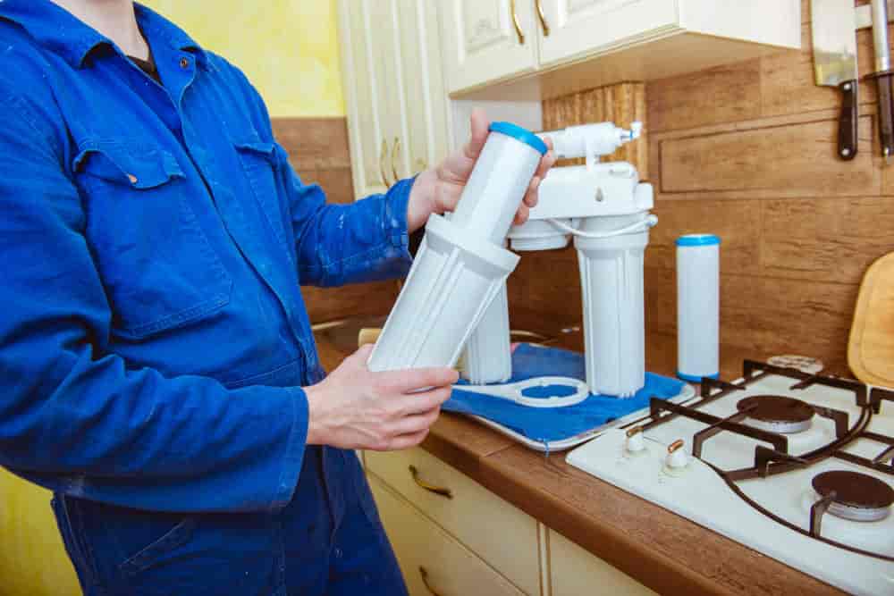 Water Purifier Repair Technicians in Shillong replacing filters