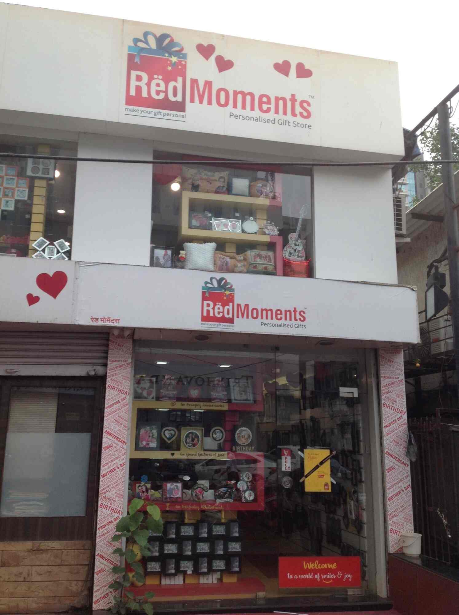 Red Moments Borivali West Gift Shops In Mumbai Justdial Portrait of positive smiling young man embracing senior elderly mother, enjoying sweet tender moment.